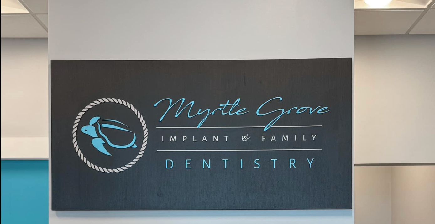 Exterior sign for Myrtle Grove Implant & Family Dentistry in Wilmington, NC