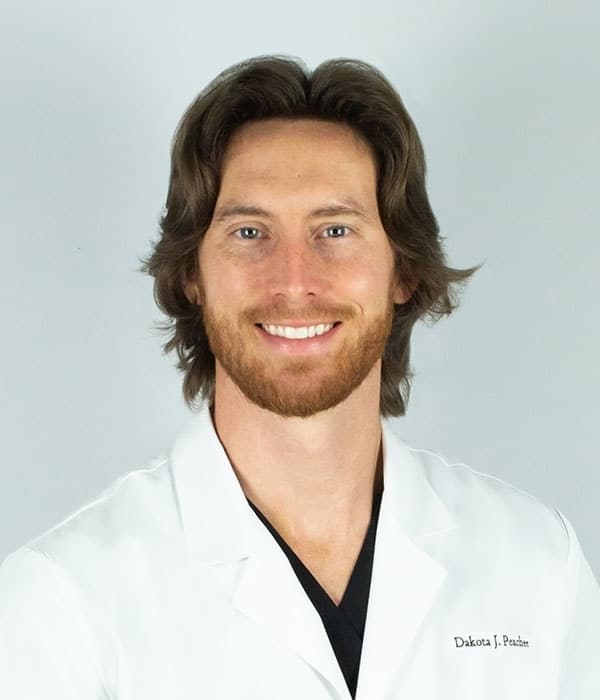 Portrait of Dr. Dakota James Peachee, dentist at Myrtle Grove Implant & Family Dentistry in Wilmington, NC